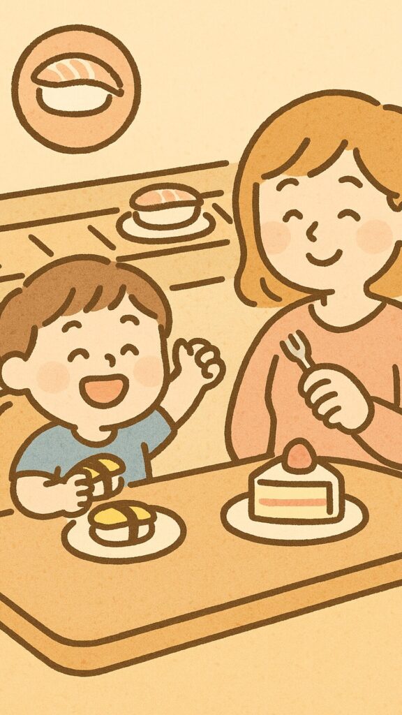シーン4- 玉子寿司とケーキで満腹 – はま寿司で玉子寿司とケーキを楽しむ親子